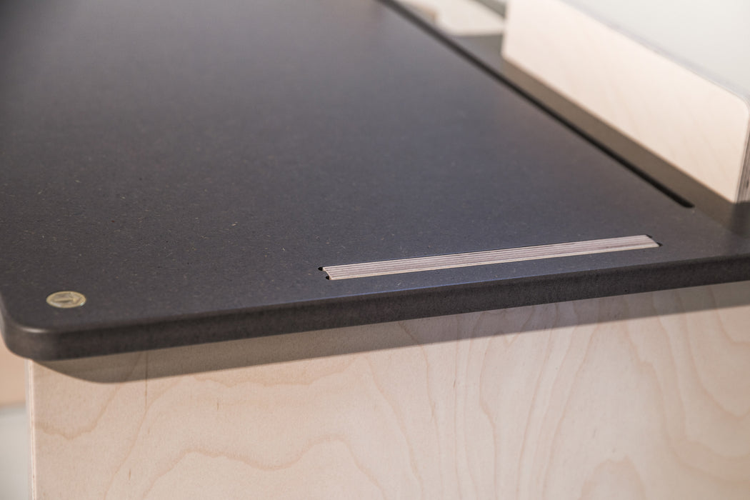 The Flo - handmade desk in Birch finsh by TORMAR shown with Flo desk